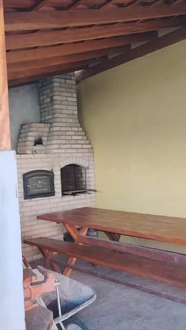 Espaço com churrasqueira da chácara à venda em Itapé, Corumbataí