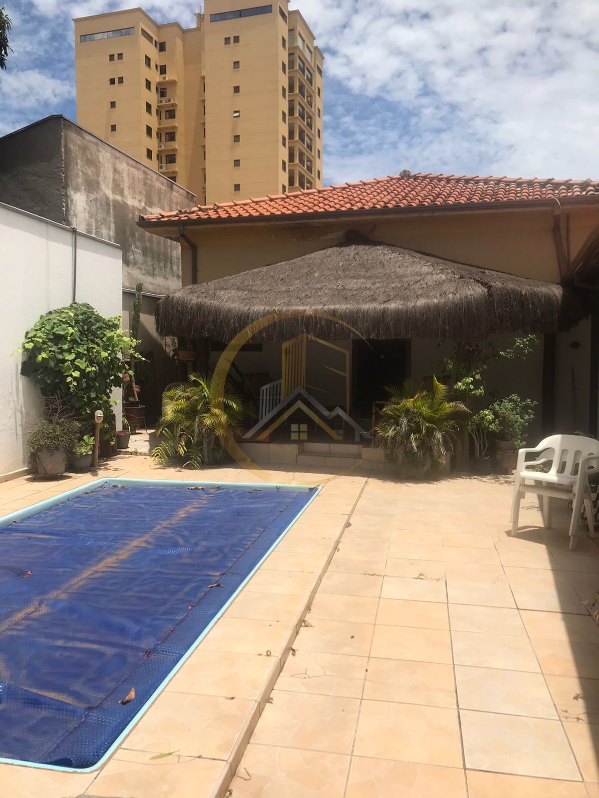 Vista externa da casa com piscina no bairro Santa Cruz, Rio Claro