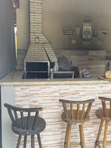 Área gourmet com churrasqueira da chácara à venda em Rio Claro/SP